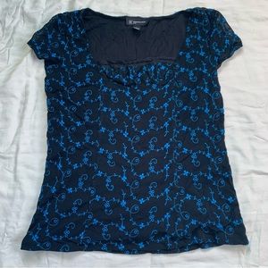 black mesh lined blouse with blue embroidery